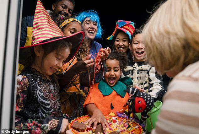 Trick-or-treaters in the Northeast, Mid-Atlantic and Great Lakes will experience one of the warmest Halloweens in decades (stock image)