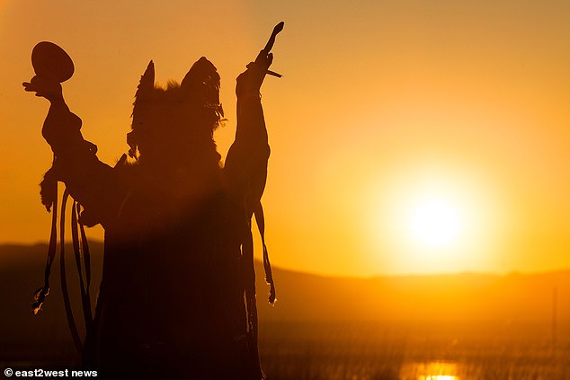 Kremlin insiders say Vladimir Putin has a deep belief in shamanism – that individuals can communicate with the spirit world. In the photo, a shaman performs a ritual in Siberia