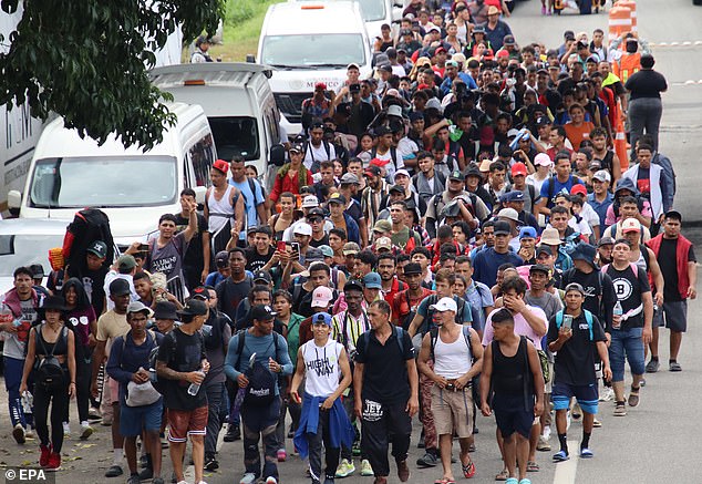 He is one of thousands of migrants – from all over the world – joining a new stampede traveling north from southern Mexico towards the US border, less than two weeks before the presidential election. (Above) Migrant caravan near Tapachula, Mexico on October 20, 2024