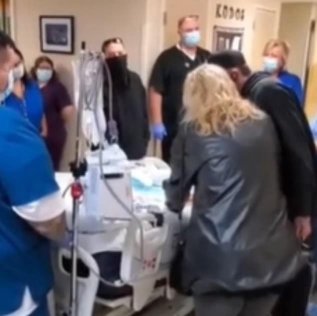 Harrowing footage shows Hoover being rolled in a hospital bed to the operating room as his heartbroken family members say their goodbyes