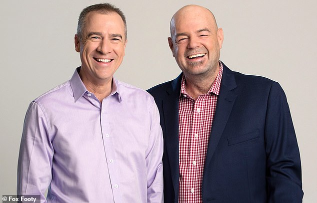 Mark Robinson (right) announced on Tuesday that he had been sacked by Fox Footy