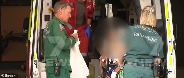 An 18-year-old boy has been rushed to hospital after he was allegedly stabbed during a brawl at an Adelaide shopping center on Wednesday