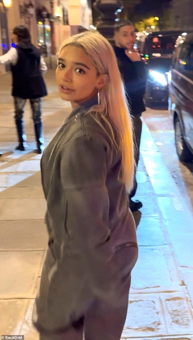 The Houston-born model, 25, was dressed in a soft gray sweatsuit as she stepped out