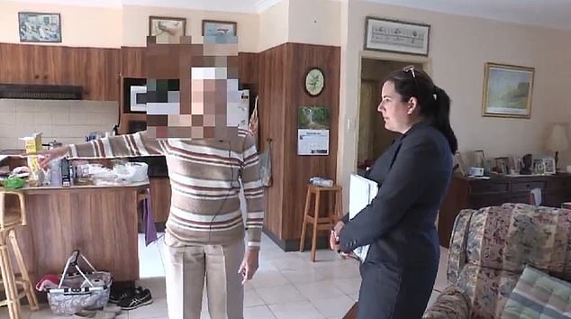 William's foster grandmother, above with a police officer during a crime scene walk through the house where the boy disappeared, was never called to testify at the inquest into the toddler's disappearance