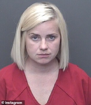 While waiting online for a carnival ride at the West Side Nut Club Fall Festival, Kristin Burnett, (pictured) 33, of Louisville, allegedly grabbed the young girl by the throat, slammed her against a metal fence and held her there held until the detectives arrived. able to pull her off the child