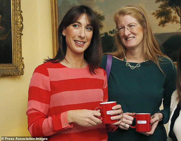 Work-life balance is a myth and telling young women they can 'have it all' is dangerous, say female leaders. Samantha Cameron (L), wife of British Prime Minister David Cameron, poses for photos with Kate Grussin, founder of Sapphire Partners, who told The Guardian it was 'dangerous' to promote the idea that women can have it all