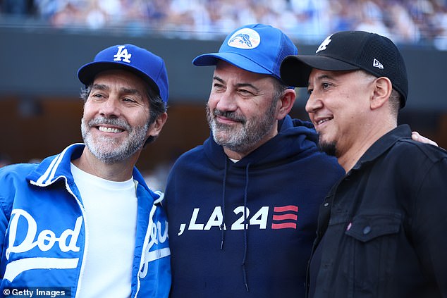 Jimmy Kimmel poses for a photo next to Jim Gentleman and Cleto Escobedo III