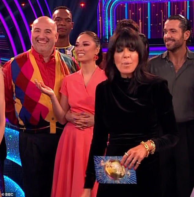 Katya Jones took no chances on dance partner Wynne Evans touching her waist again by standing next to professional Nancy Xu – who wrapped her arms around the Russian beauty