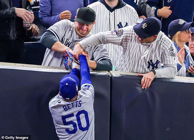 The Yankees fan who stole the ball from Mookie Betts is expected to return for Game 5