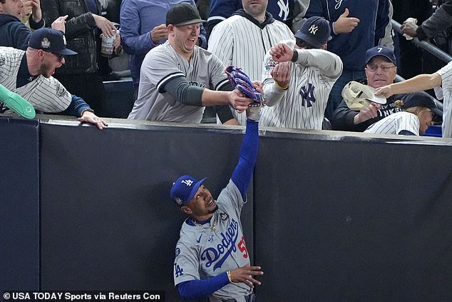 The Yankees fan who tried to snatch a ball from Mookie Betts' glove spoke out after the incident