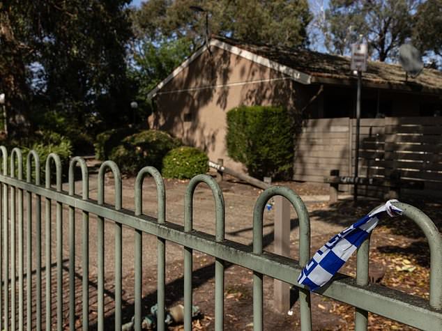 A murder investigation has been launched following the suspicious death of a man at a home in Melbourne's east (the taped-off property is pictured)