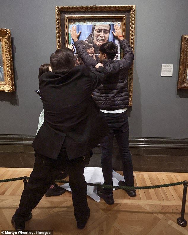 The two supporters walked into room 43 of the gallery just after noon and posted a photo of a Gaza mother clutching her child over the protective glass.