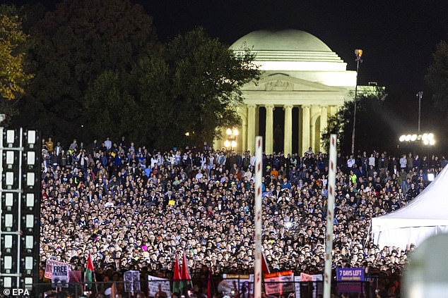 Supporters could be seen stretching beyond the security perimeter across the National Mall, with the Jefferson Monument in the background