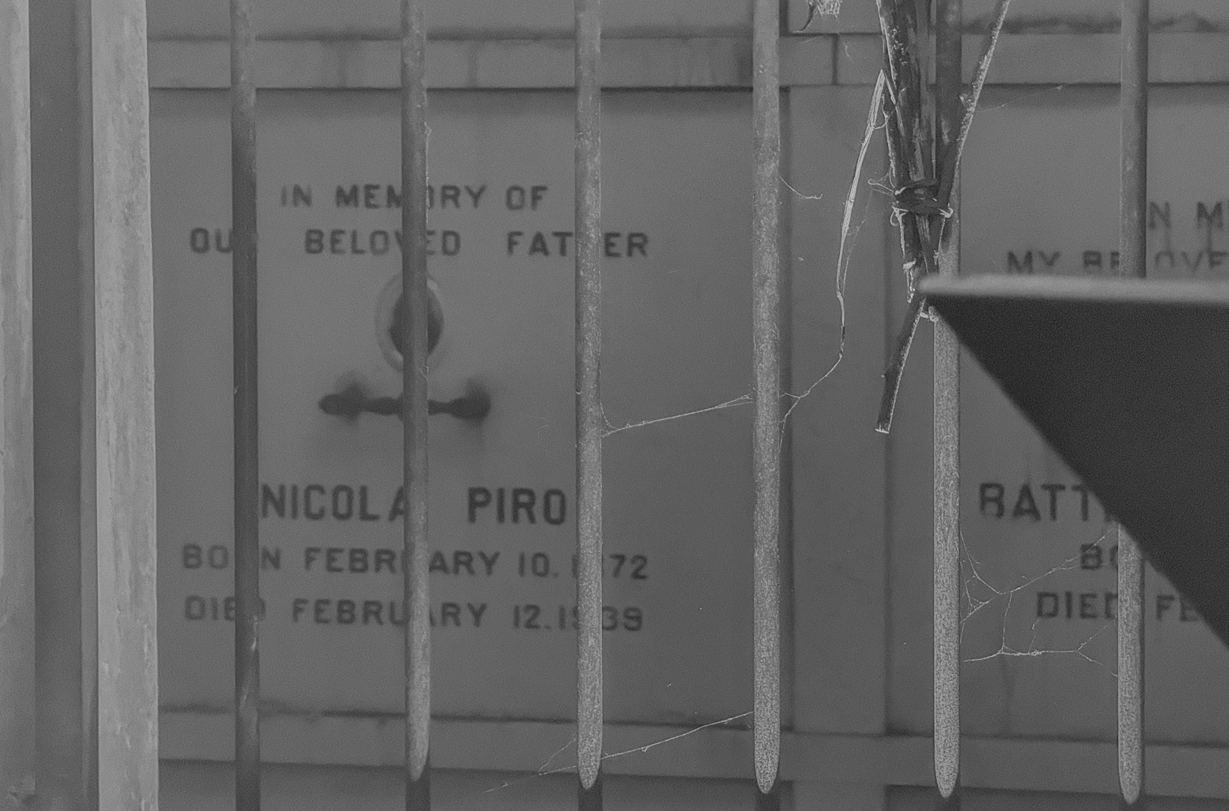 A look at said resting places behind a metal grille from Margaret Leng Tan's October 3, 2024 performance of Curios in the Catacombs at Green-Wood Cemetery in New York