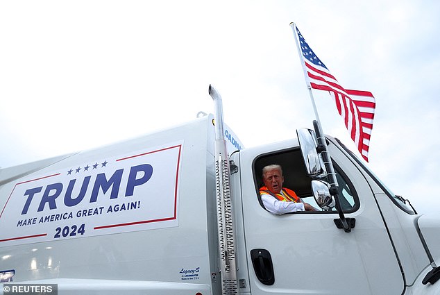 Trump drove a garbage truck while on the campaign trail in Wisconsin after Biden called his supporters trash