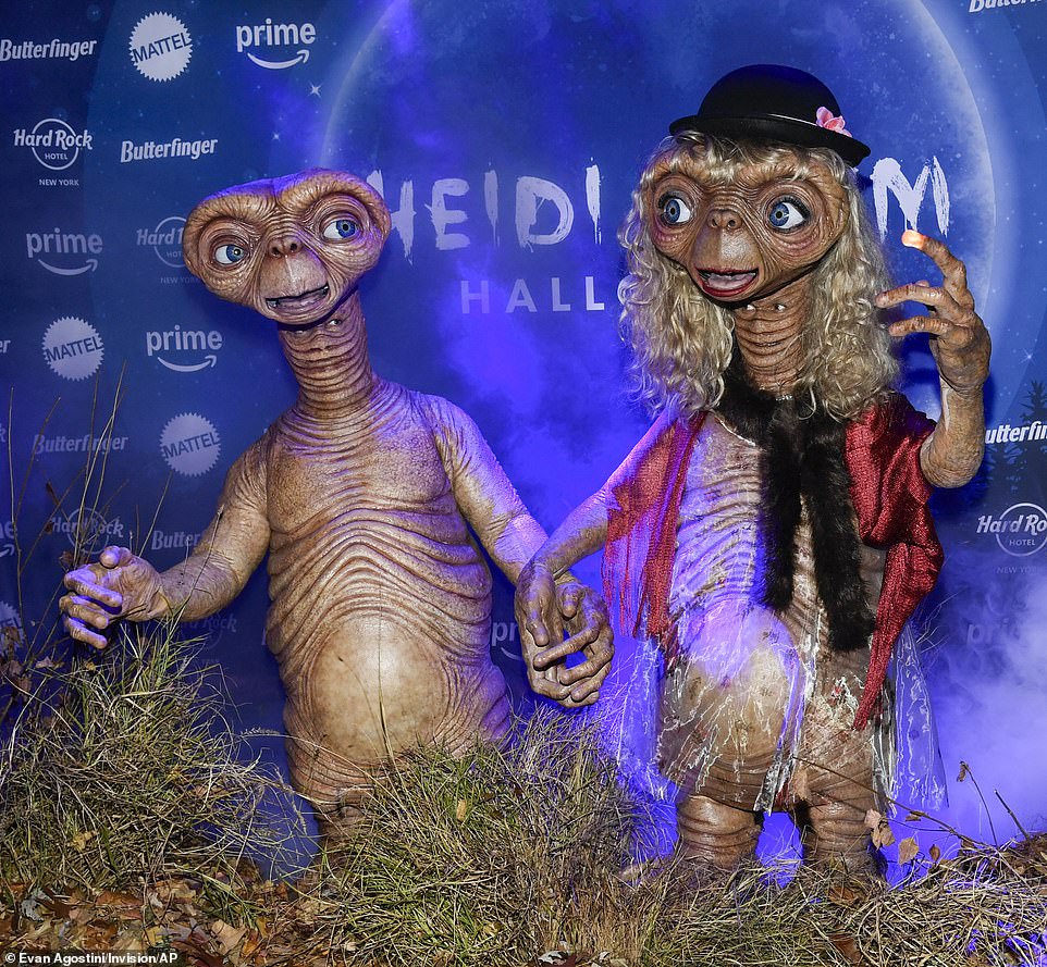 On October 31, the supermodel, 51, made her grand arrival at her famous annual Halloween soiree alongside the musician, 35, dressed as the alien from the 1982 cult classic, ET the Extra-Terrestrial.