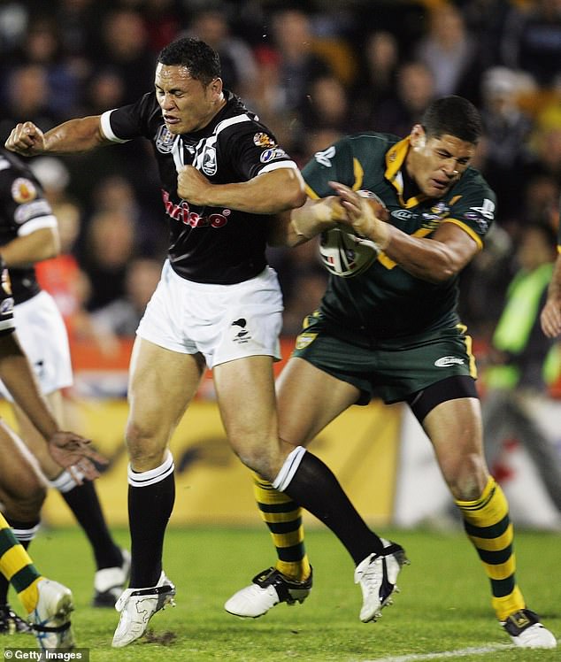 New Zealand forward David Kidwell smooths over Mason in the same match with a crushing tackle in response to his apparent disrespect for the Haka