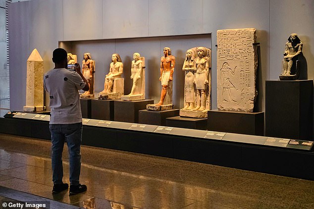 Visitors will have to wait for a glimpse of Tutankhamun's treasures. The ancient pharaoh's golden mask and sarcophagus are still in the original museum in Tahrir Square, while the relocated objects are not yet on display. Above - Pharaonic statues in the new museum