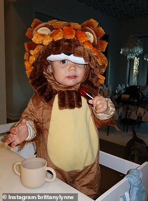 Bronze, soon to be two, looked cute and fierce as a lion for Halloween