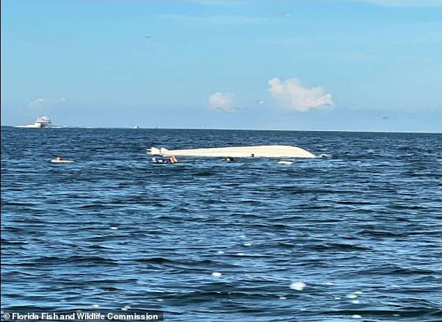 The ship capsized and all fourteen people on board ended up in the water