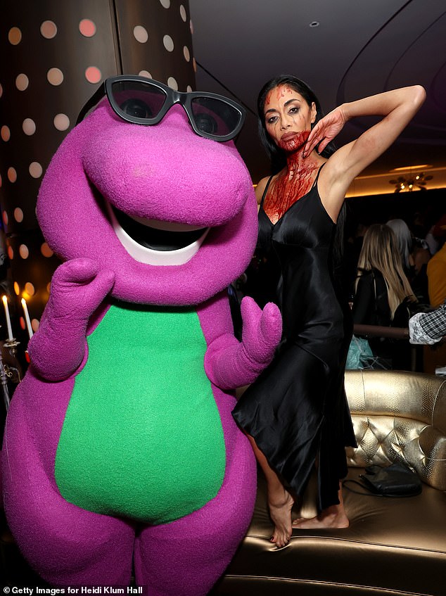 Nicole also caused up a storm alongside Barney the Dinosaur