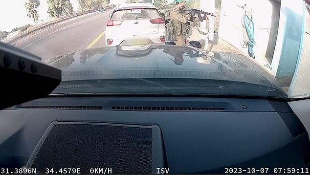 Chilling footage captured by the dashcam of a car parked outside the shelter shows several armed terrorists swarming the shelter and firing shots through the entrance at people inside