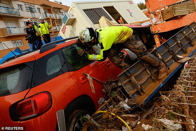 Search and rescue teams have begun searching for survivors (pictured). It has already been confirmed that 155 people have been killed