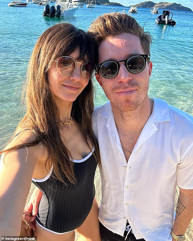 The couple opened up about the proposal to Vogue (pictured while on holiday)