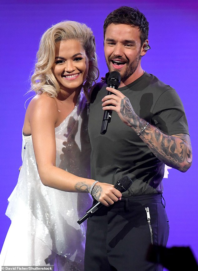 Rita will reportedly honor beloved late friend and One Direction star Liam Payne, following the singer's tragic death at the age of 31 earlier this month (Rita and Liam are pictured in 2018)