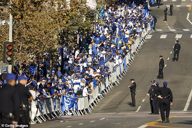 Fans lined the streets of Los Angeles for their first World Series parade since 1988