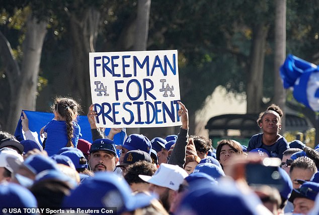 Many in Los Angeles waited hours to catch a glimpse of the Dodgers World Series victory parade