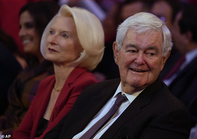 Newt Gingrich and his wife Callista pictured at the Republican campaign rally in New York City on October 27