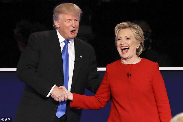 Republican presidential candidate Donald Trump and Democratic presidential candidate Hillary Clinton shake hands after the presidential debate in Hempstead, NY, September 26, 2016