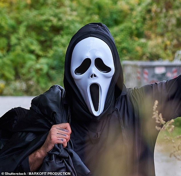 The research began in 2006 when Professor John Marzluff, an environmental scientist at the University of Washington, put on a scary mask and caught seven crows in a net (stock image of a man wearing a scary mask)