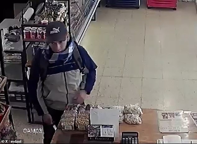 The suspect stared at the deli employees as they held a knife during the botched robbery