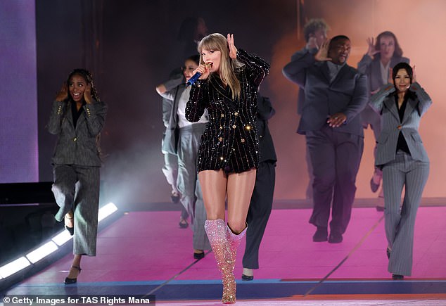 She was accompanied by her backup dancers as she sang in front of the record-breaking crowd at Indy Stadium