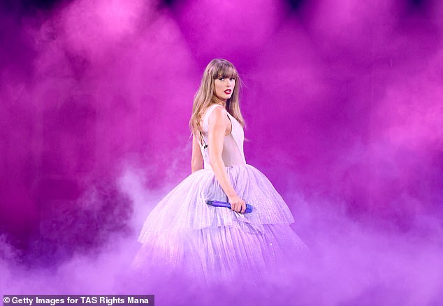 During the Speak Now performance, she looked ethereal as she donned her lavender dress and walked into the mist