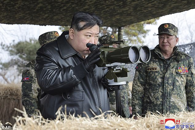 File image shows dictator Kim Jong Un overseeing artillery fire exercises in North Korea in March