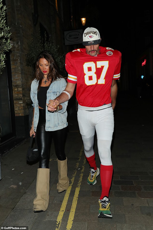 The couple looked cozy as they attended the Halloween event together