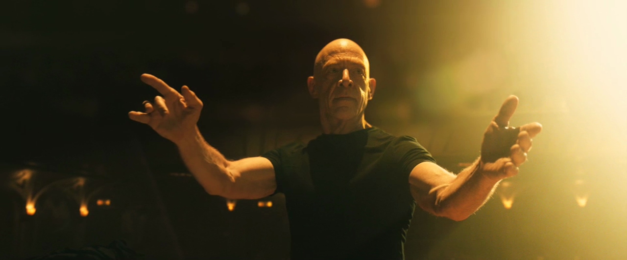 JK Simmons conducts an orchestra in Whiplash.