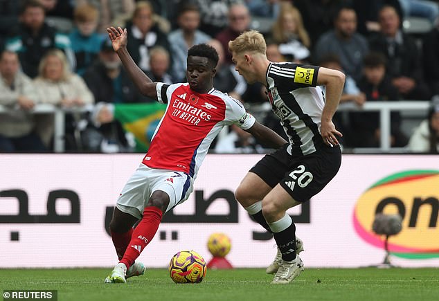 Lewis Hall, right, impressed for Newcastle when he faced Arsenal star Bukayo Saka