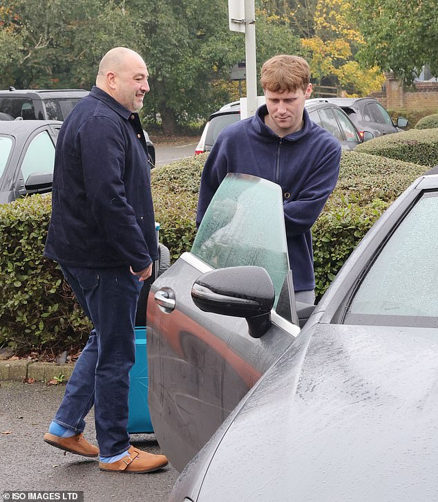 Wynne Evans cut a casual figure in a dark blue shacket that he wore over a white T-shirt and jeans as he stepped out of the car with fellow celeb dancer Jamie Borthwick