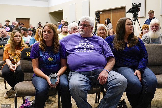 Family members of Liberty German and Abigail Williams listen as Indiana State Police Capt. Doug Carter announces the arrest of Richard Allen, 50, for the murder of two slain teenage girls during a hiking trip in Delphi, Indiana, Monday, Oct. 31, 2022. 2017 in northern Indiana