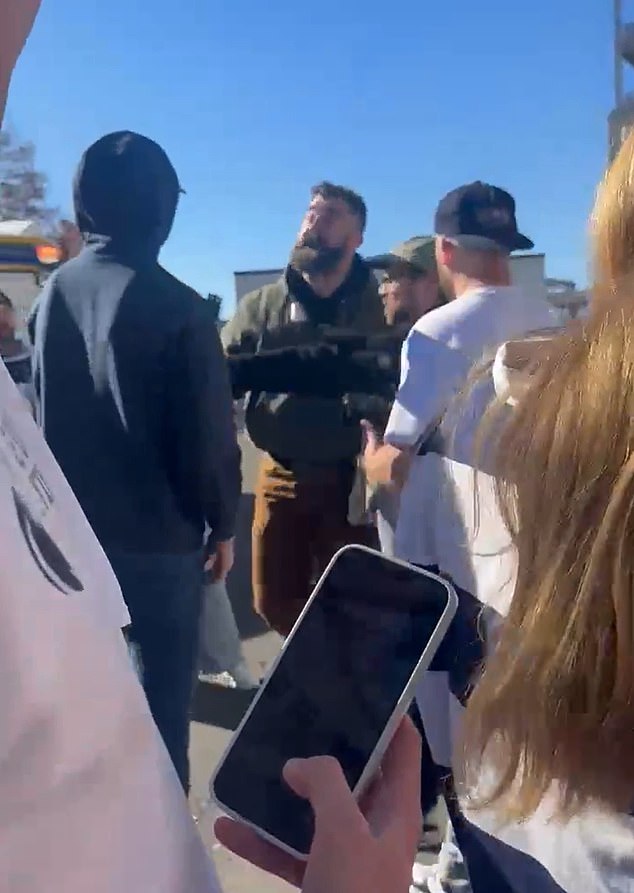 Kelce then walked away with the man's phone before asking him: 