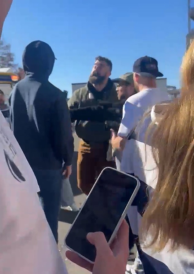 Kelce then walked away with the man's phone before asking him, 