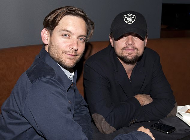 Tom, 32, known for his time fronting bands At Sunset and Darling Brando, spoke candidly on the A Bit Rogue podcast and recalled the surreal night he mingled with A-list stars and T-Rex skeletons, all under DiCaprio's roof. . (Tobey Maguire and Leo pictured)