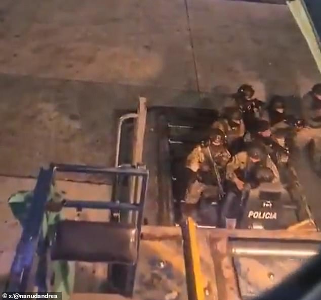 The chilling incident led to armed officers storming the cargo hold upon their return, all of which was captured on dramatic video footage