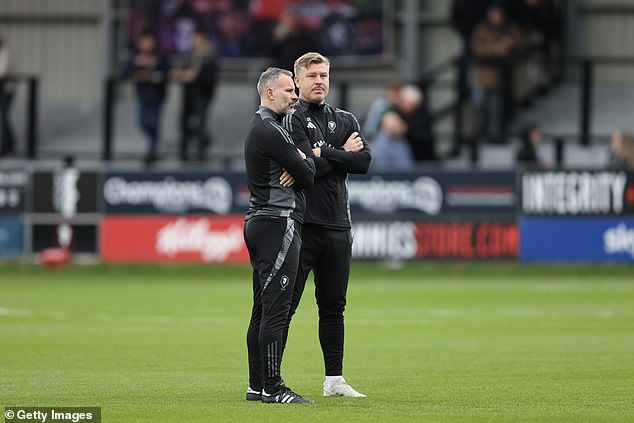 Giggs was seen on the pitch before the match as both teams performed their warm-ups