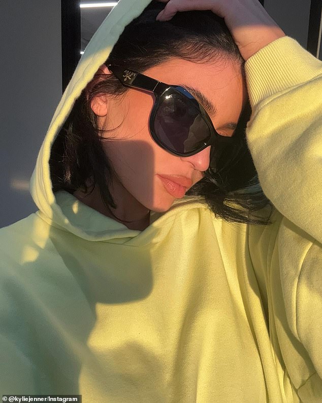 The Keeping Up With The Kardashians alum would amp up the cool factor with dark shades