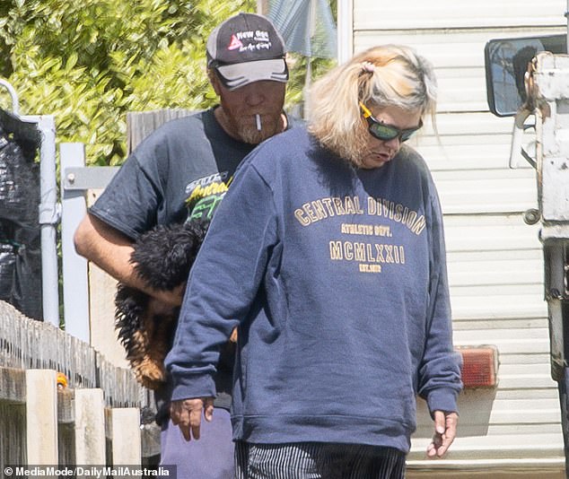 Jamie McCulloch and Jacinta King photographed outside their caravan home in Devonport this week